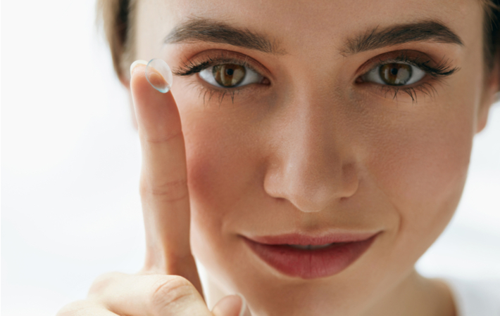 Girl Holding Contact Lens