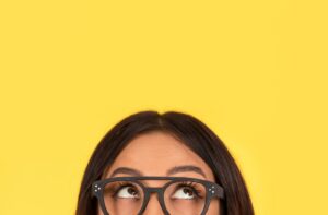 A portrait of half of a woman's face looking up to the right