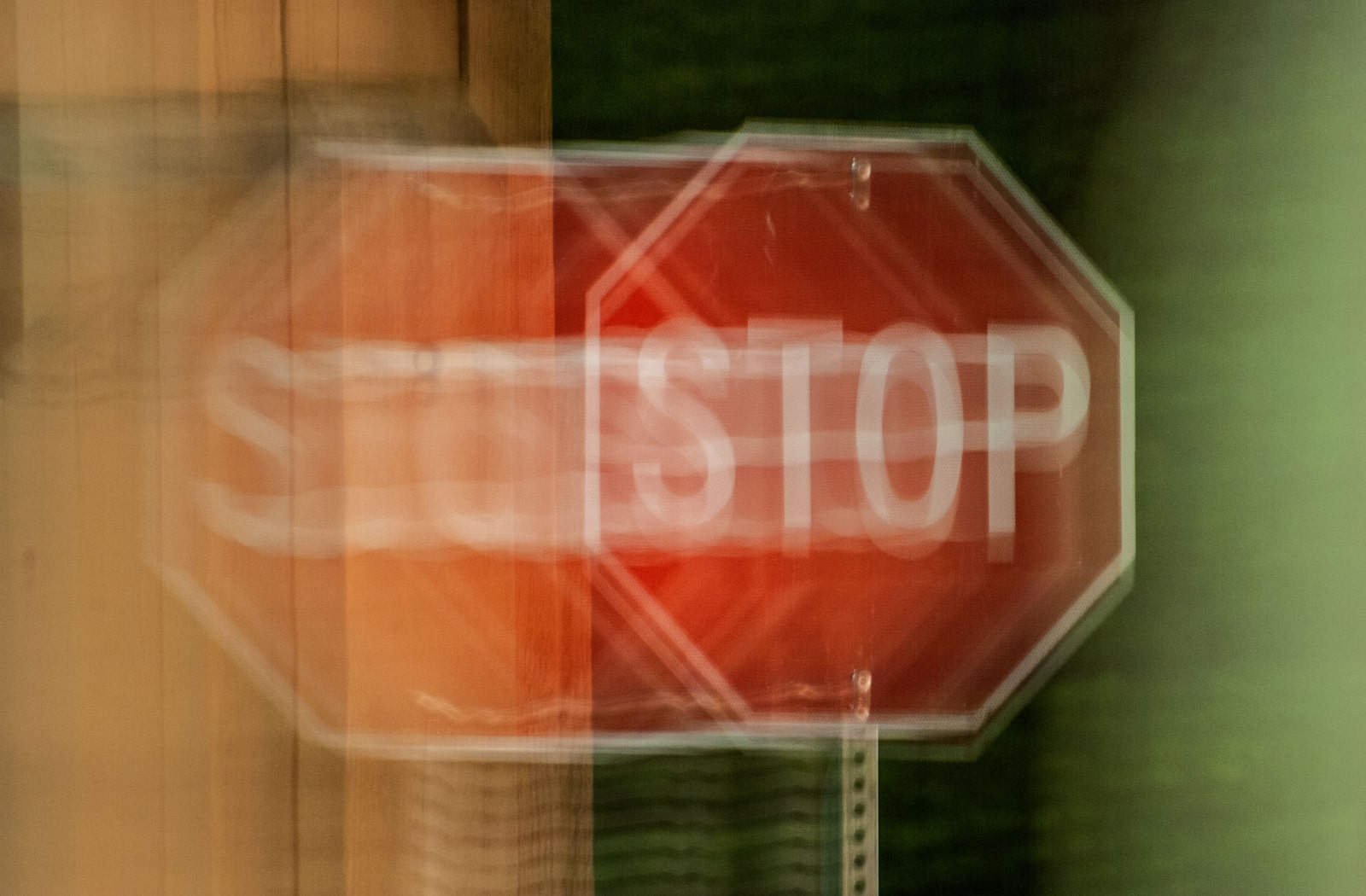 An image of a stop sign, but the image is distorted to reflect blurry vision