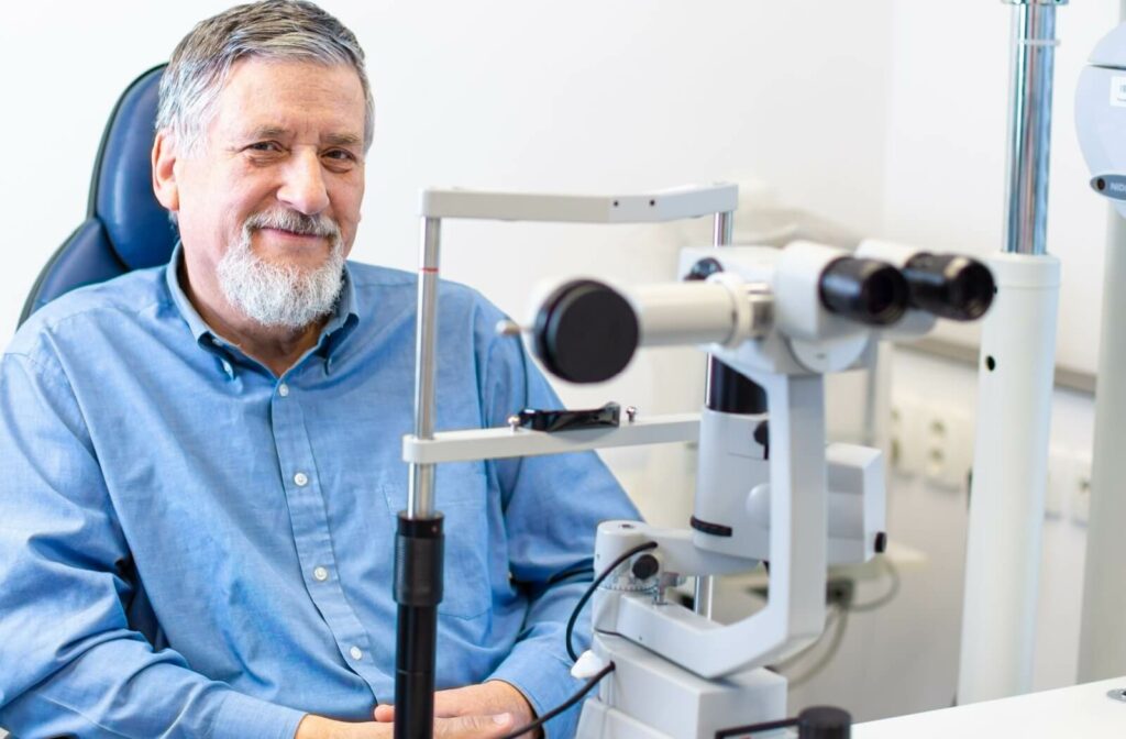 Man getting an eye exam in an optometrist’s office, checking for age-related vision changes.