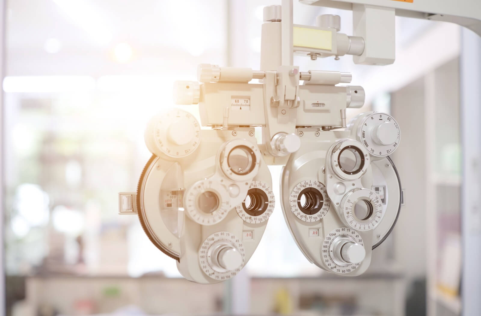 Close-up of a phoropter used during an eye exam to measure vision and prescription.